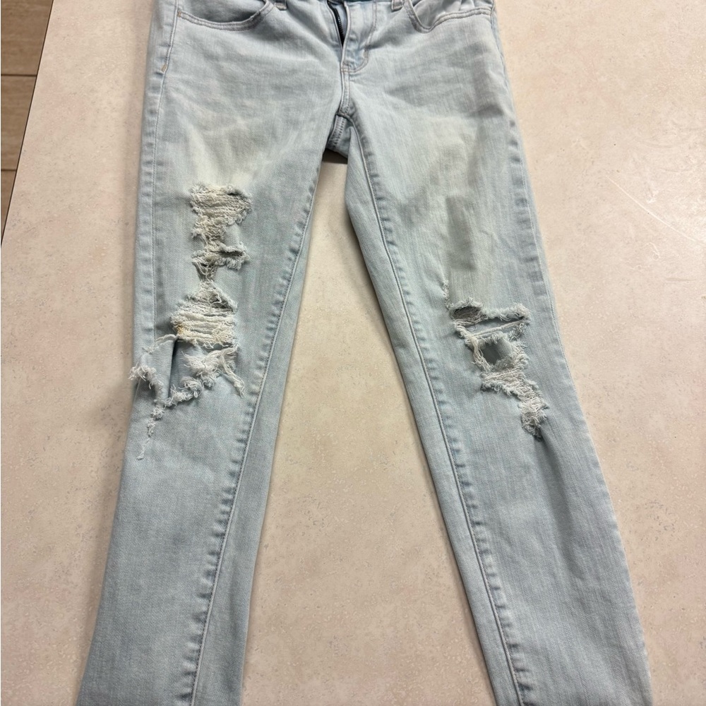 American Eagle Blue Skinny Jeans with Distressed Details